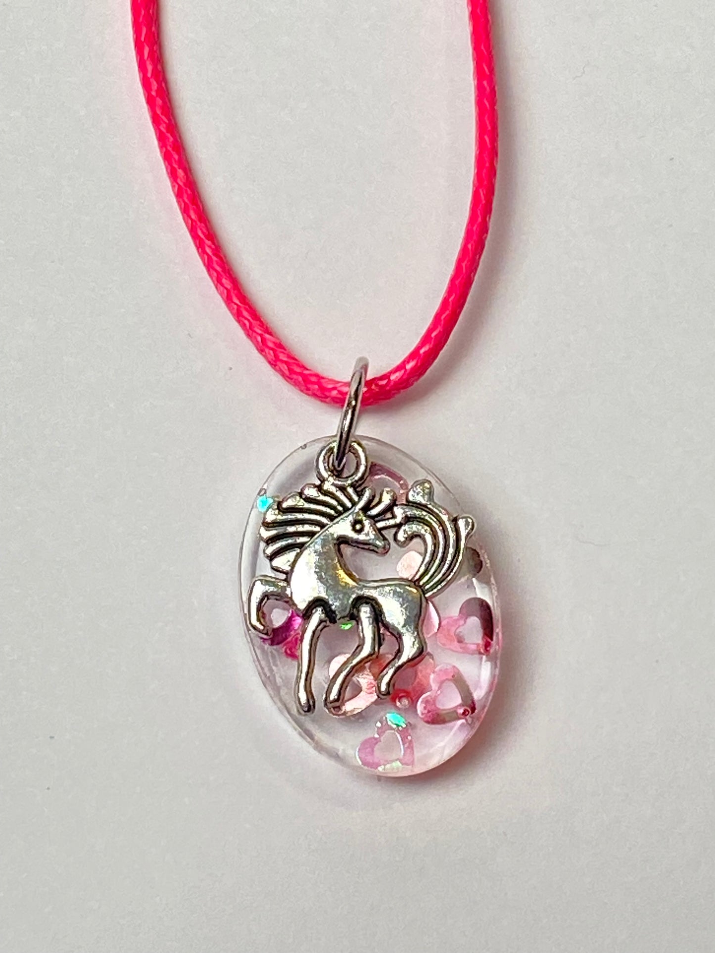 Horse with Hearts Glitter in Clear Resin Necklace