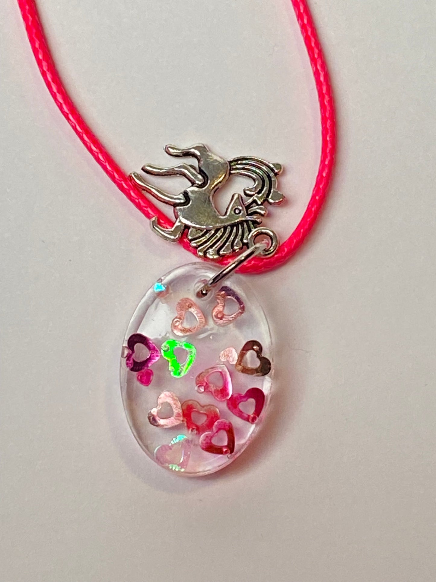 Horse with Hearts Glitter in Clear Resin Necklace