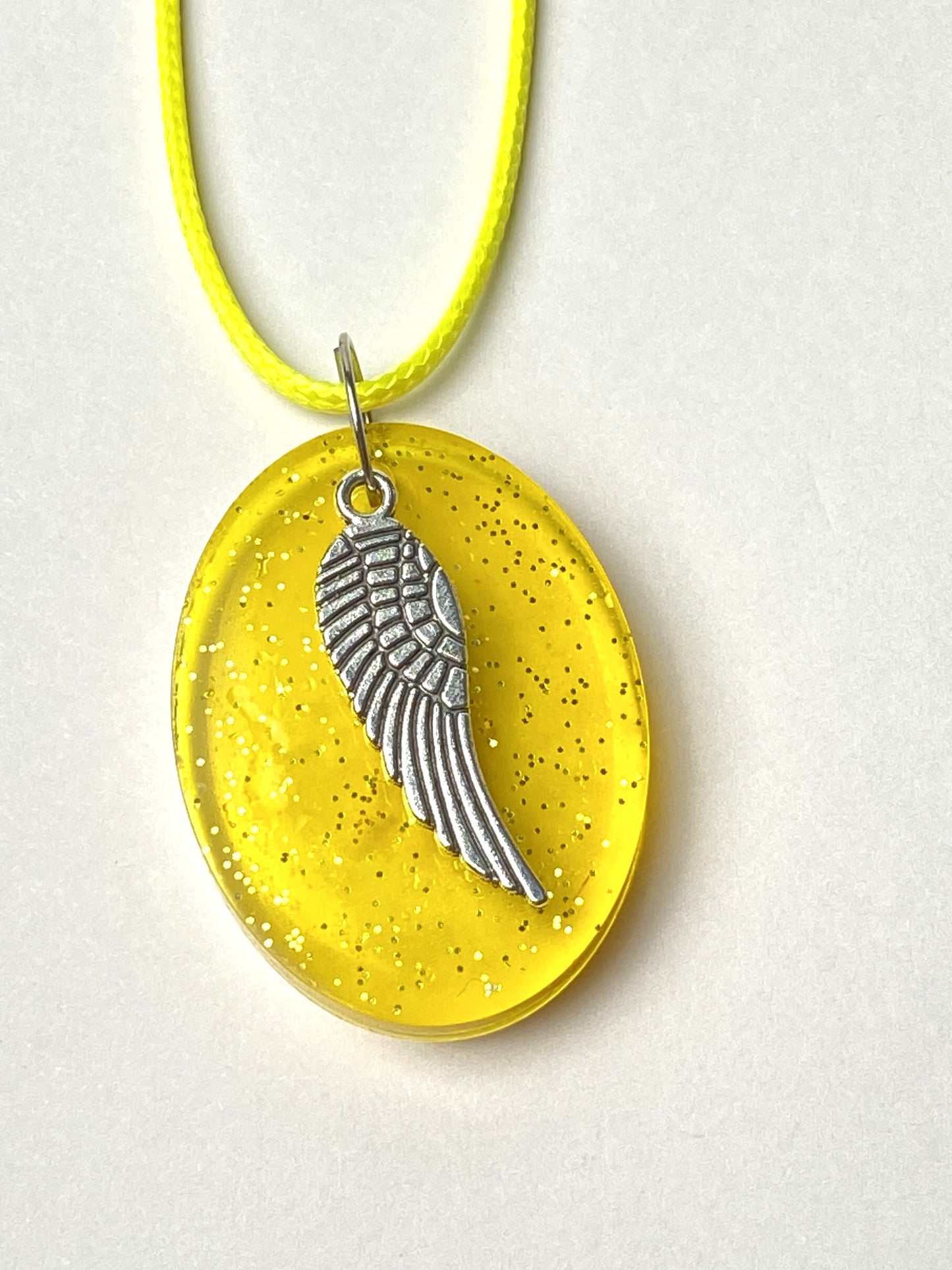 Wing Charm with Yellow Gold Resin Necklace