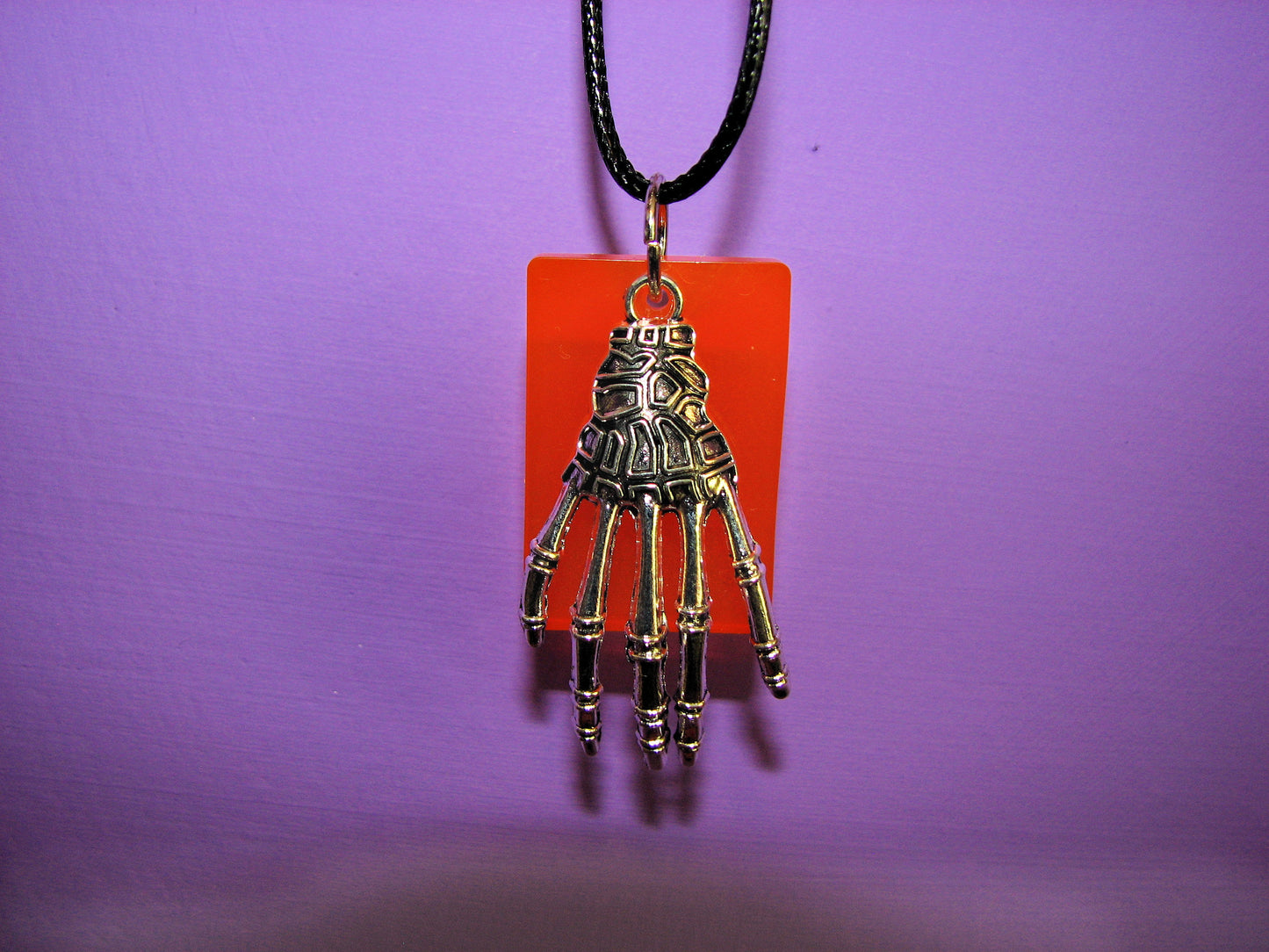 Skeletal Hand Resin and Charm Necklace