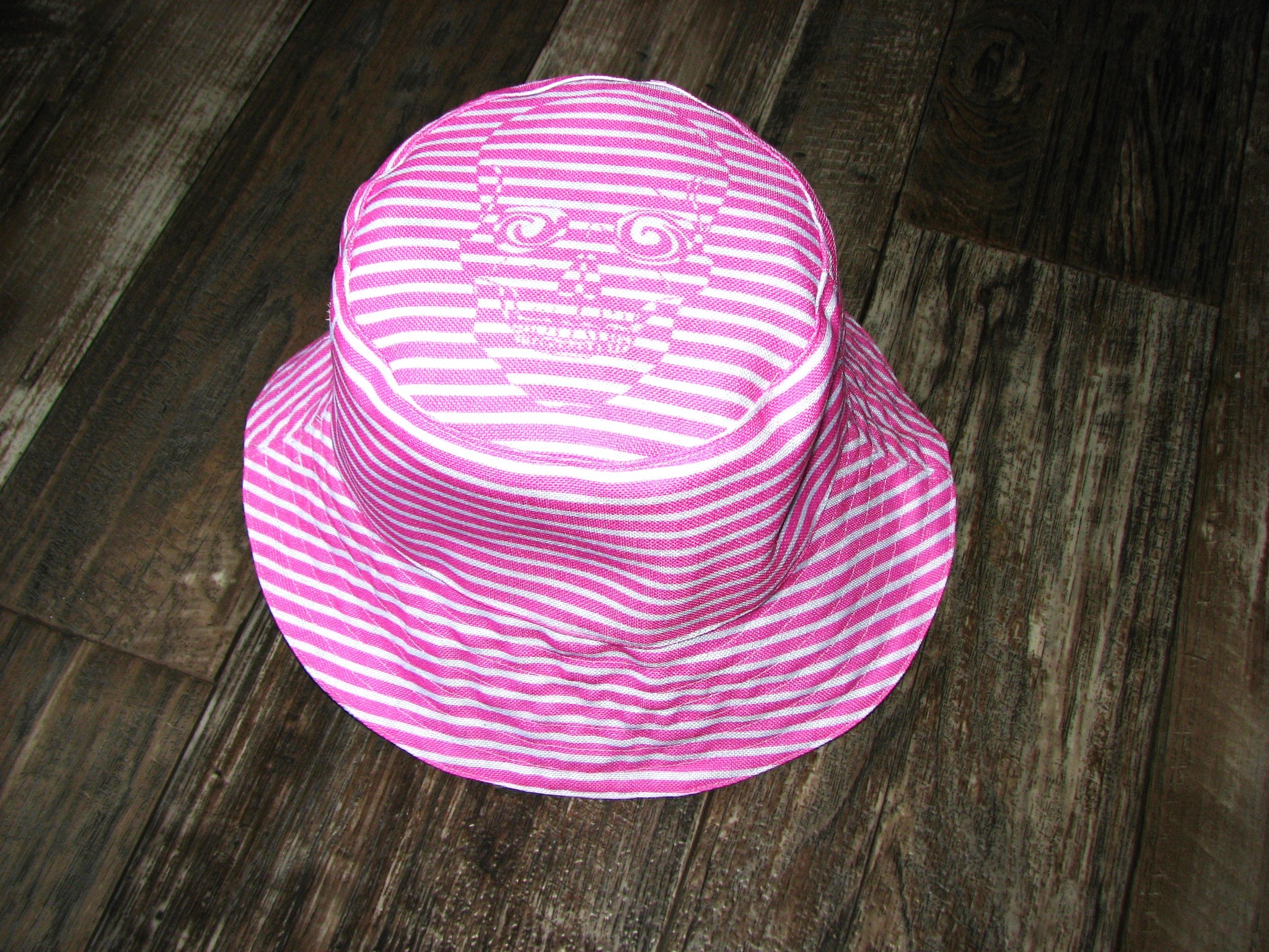 Skulls and Pink Blossoms with Pink Dizzy Skull Reversible Bucket Hat