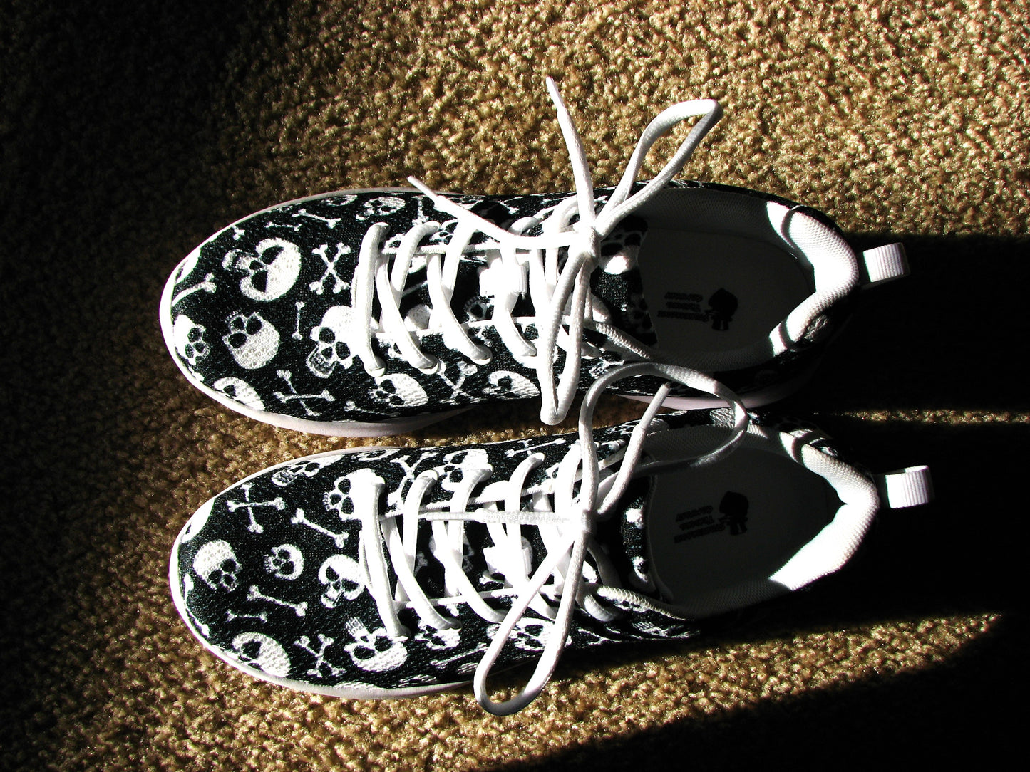 Skulls and Crossbones Women’s Athletic Shoes